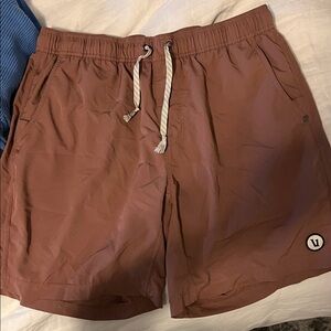 Vuori Athletic Shorts in Rust